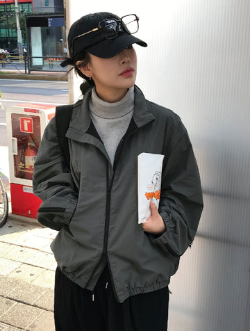 MULTI ZIPPER WINDBREAKER